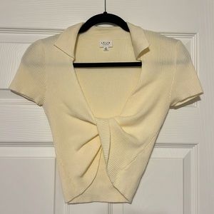 Lelis medium twist front crop top with collar